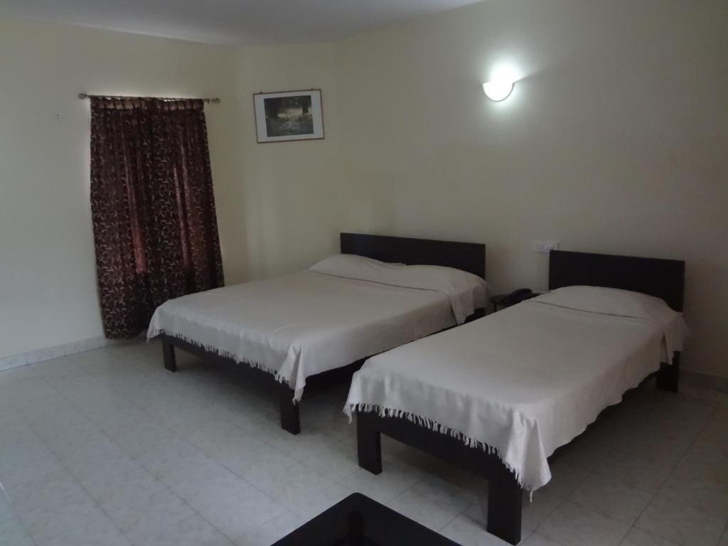 Hotel Crystal Court Madikeri Chambre photo